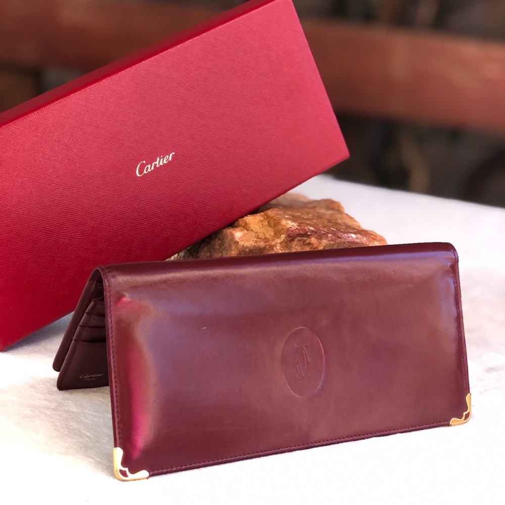 2 HRS SALE! Cartier FRANCE Unisex oxblood red leather bifold long wallet